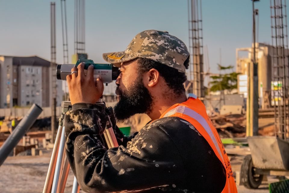 Surveyor capturing an existing building